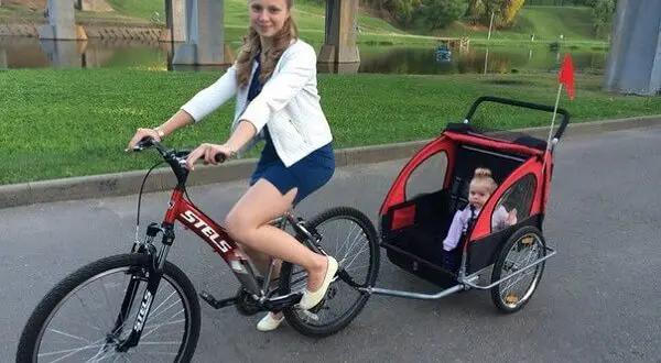 Remolque de bicicleta para niños - características y tipos